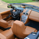 Illustration for article titled Why Buy A Used M3 When You Can Get A Sexy V12 Aston Martin Convertible?